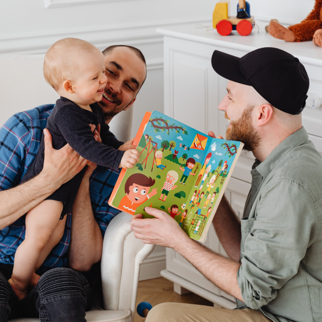 foster dads reading to young child